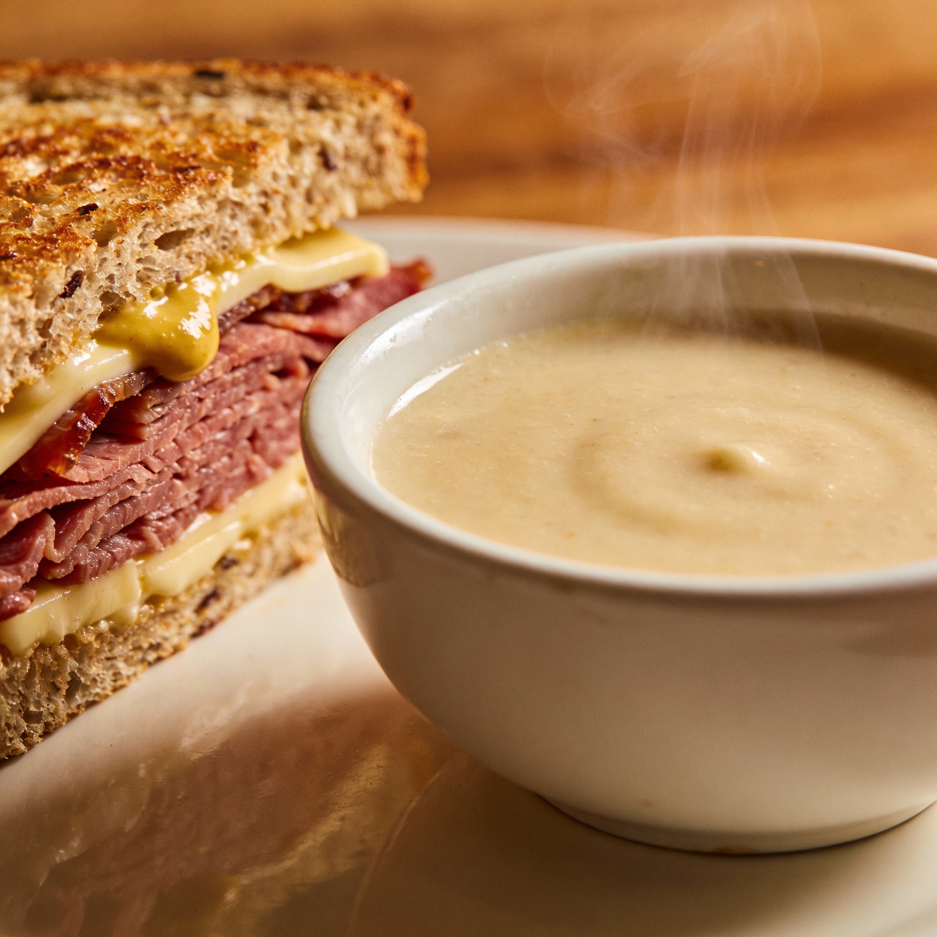 Small Soup And A Half Of Pastrami Sandwich